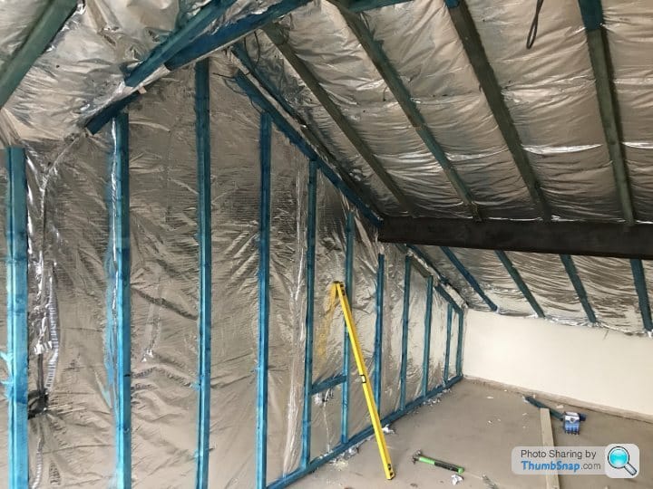 Professional SuperFOIL insulation installation for improved thermal efficiency